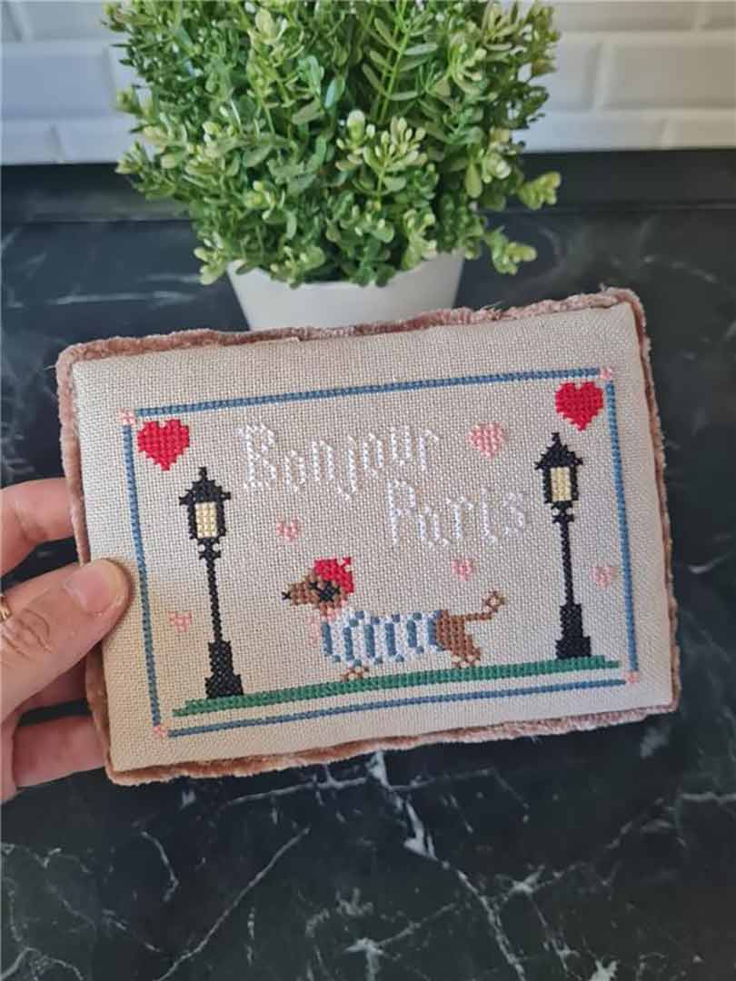 A stitched preview of the counted cross stitch pattern Bonjour Paris! by Kate Spiridonova
