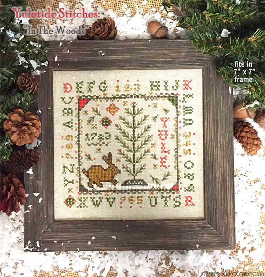 A stitched preview of the counted cross stitch pattern Yuletide Stitches: In The Woods by The Calico Confectionery