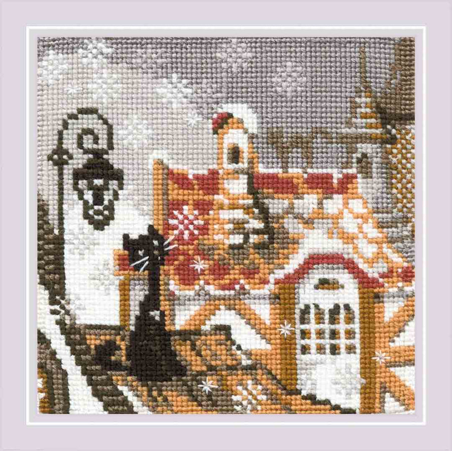 A stitched preview of City And Cats Winter Counted Cross Stitch Kit