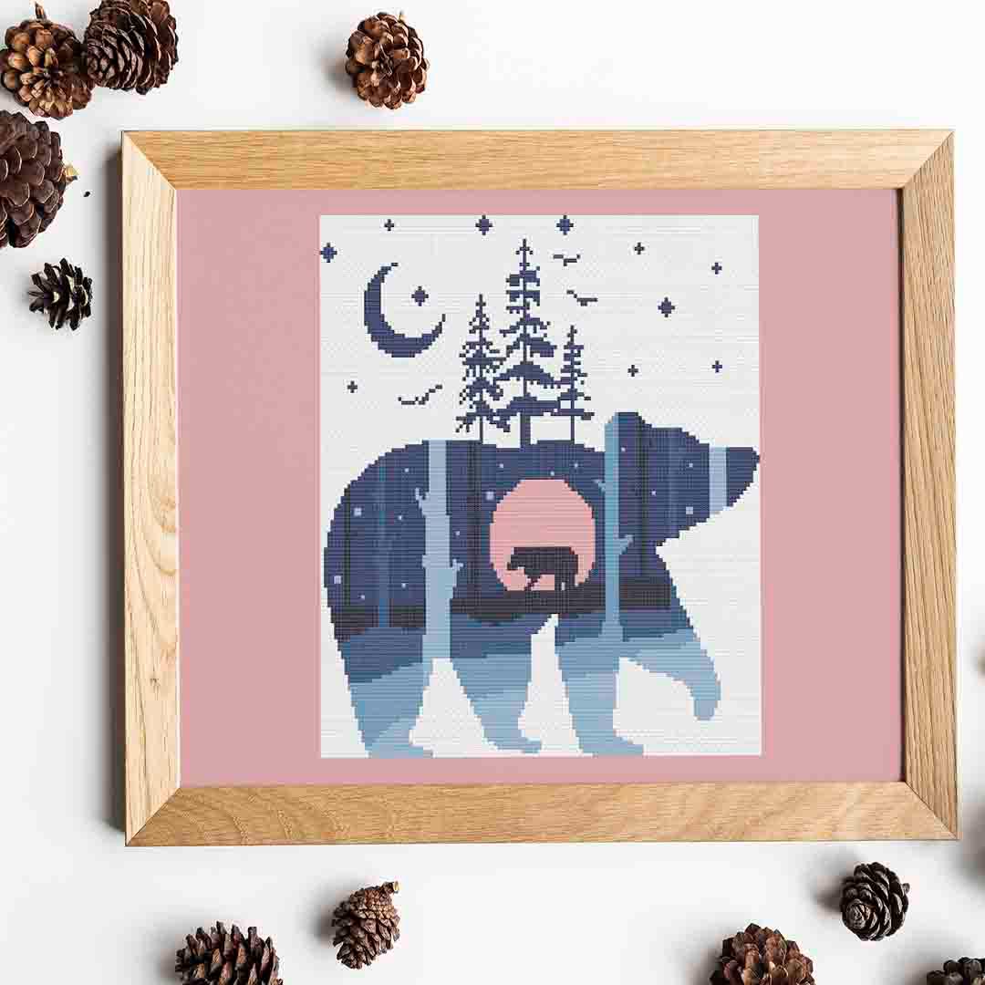 Stitched and framed preview of Winter Bear Counted Cross Stitch Pattern and Kit