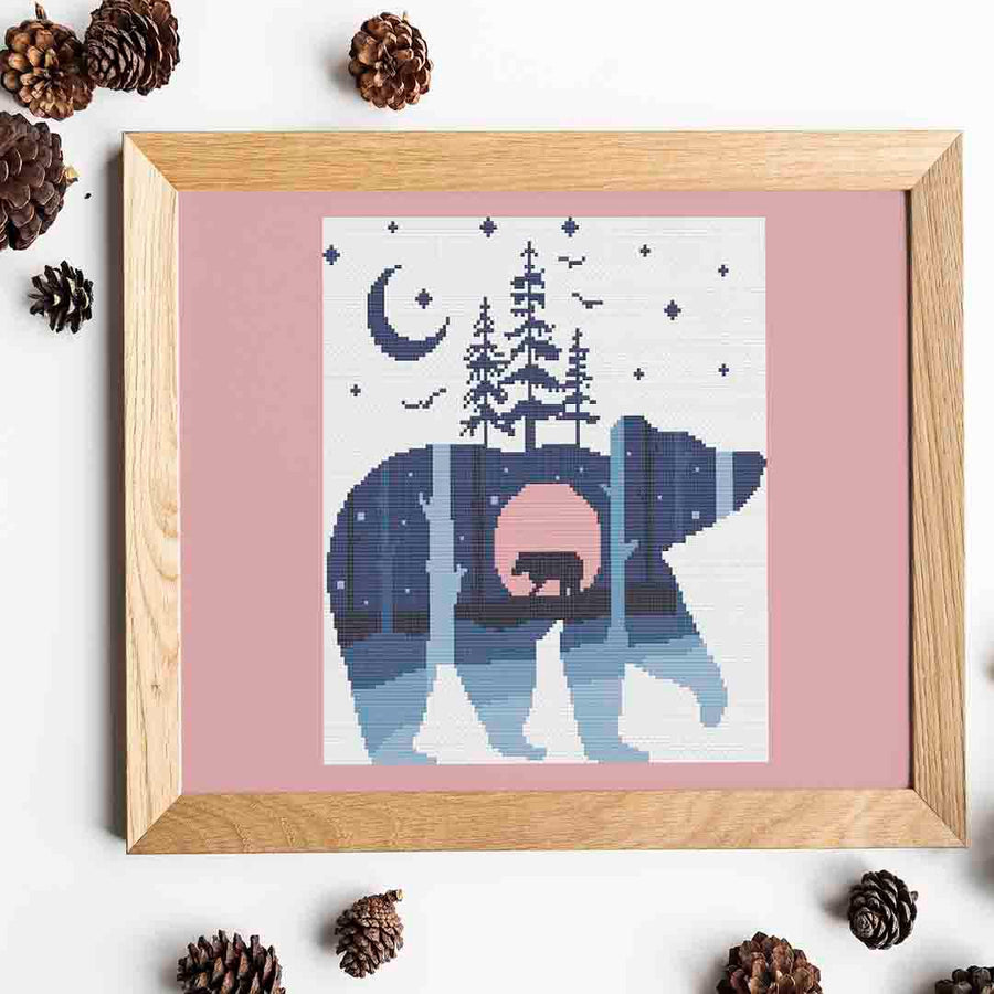 Stitched and framed preview of Winter Bear Counted Cross Stitch Pattern and Kit