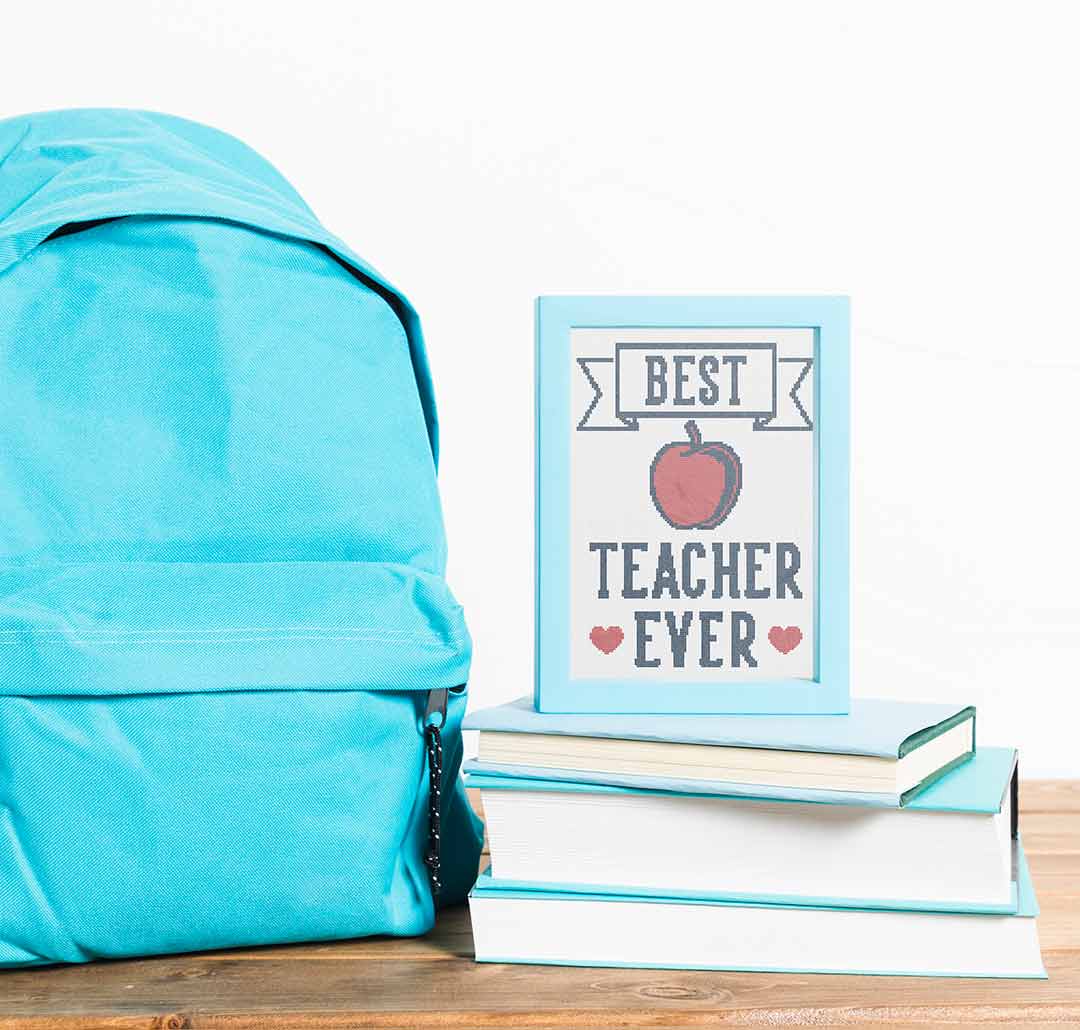 Stitched and framed preview of Best Teacher Counted Cross Stitch Pattern and Kit
