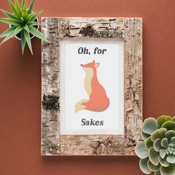 Stitched and framed preview of Fox Sakes Counted Cross Stitch Pattern and Kit