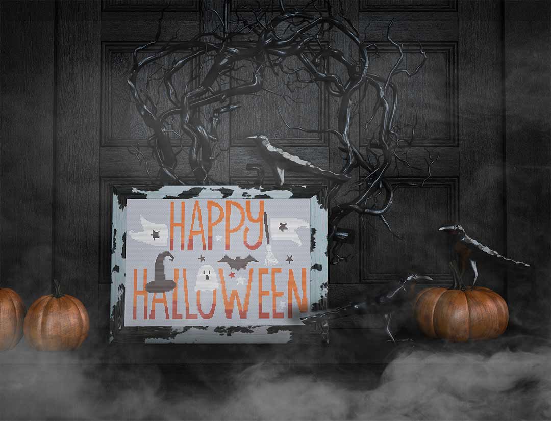 Stitched and Framed preview of Happy Halloween Counted Cross Stitch pattern and Kit