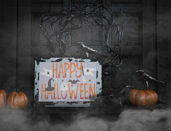 Stitched and Framed preview of Happy Halloween Counted Cross Stitch pattern and Kit