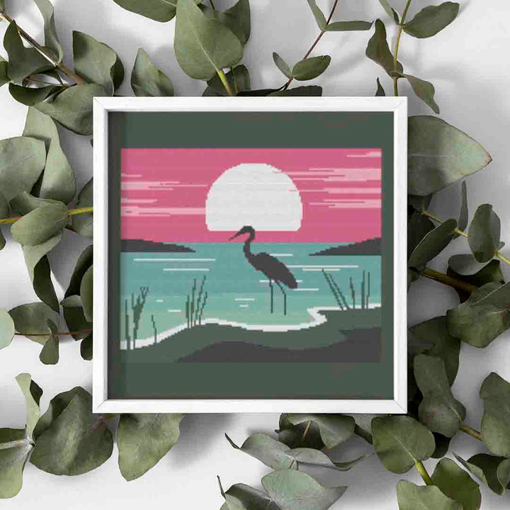 Stitched and framed preview of Heron Counted Cross Stitch Pattern and Kit