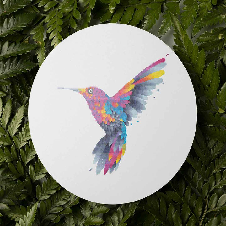 Stitched and framed preview of Hummingbird Counted Cross Stitch Pattern and Kit