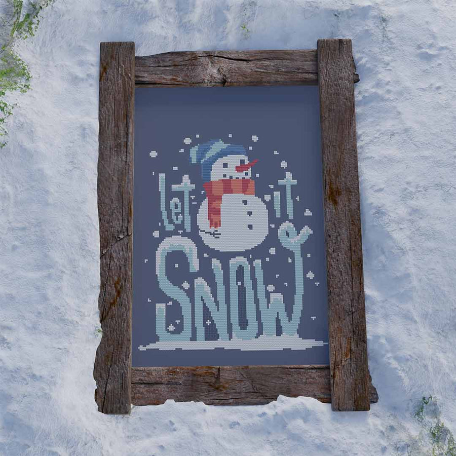 Stitched and framed preview of Let It Snow Counted Cross Stitch Pattern and Kit