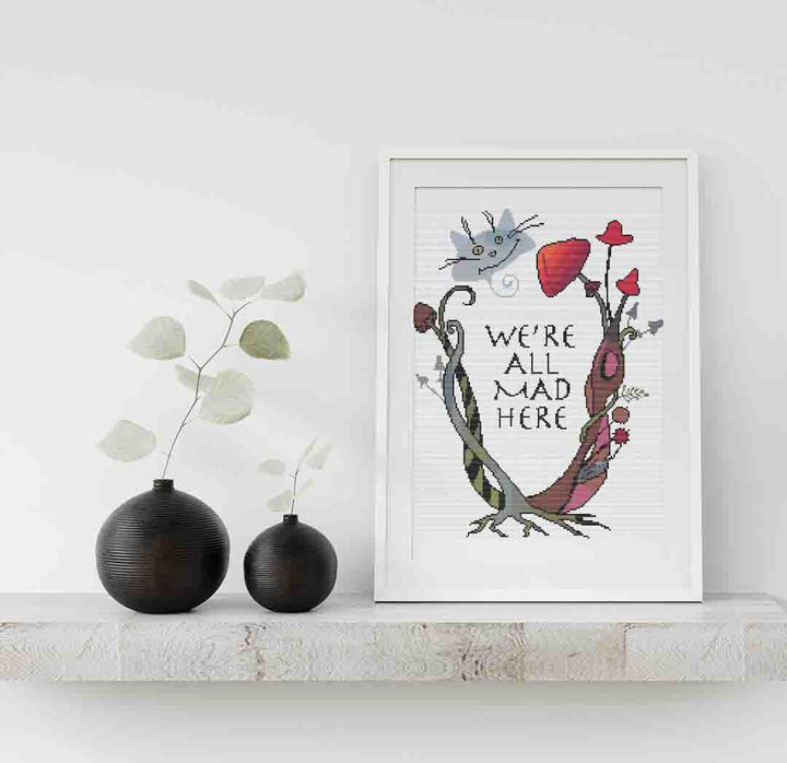Stitched and framed preview of Mad House Counted Cross Stitch Pattern and Kit