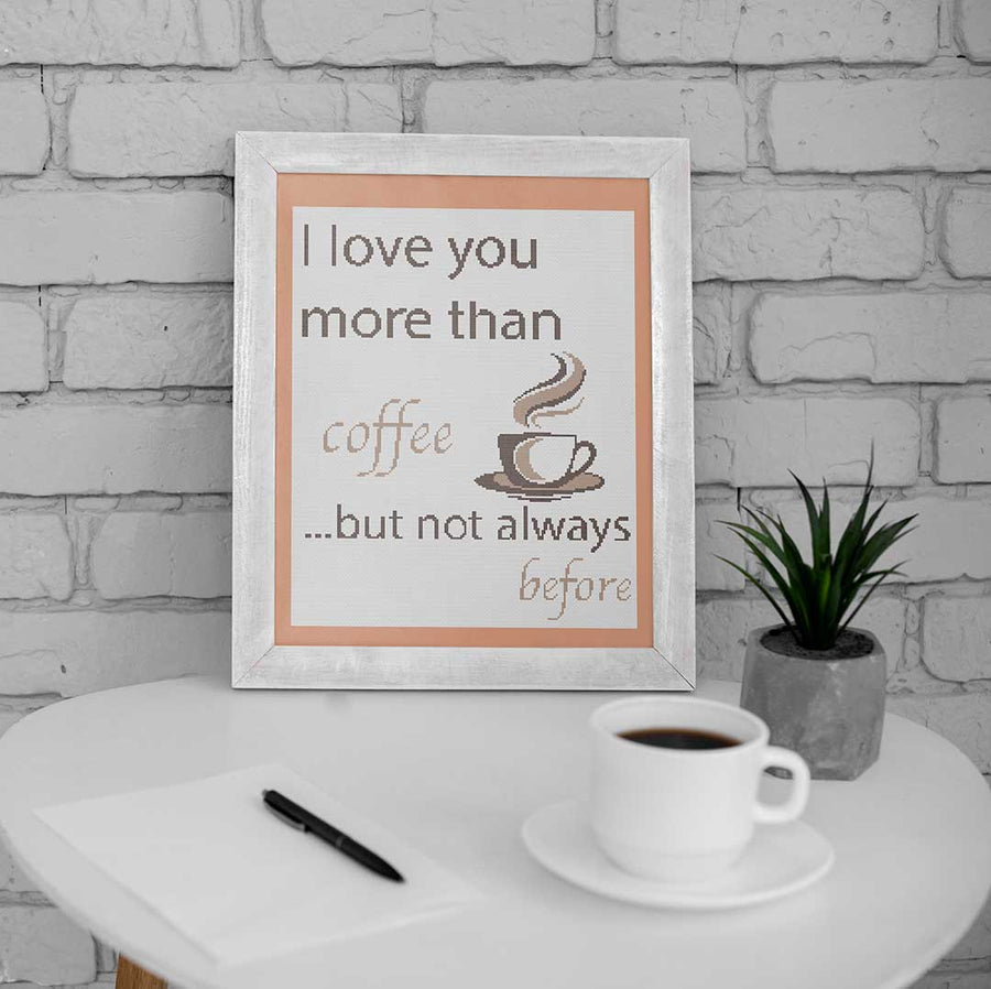 Stitched and framed preview of More Than Coffee Counted Cross Stitch Pattern and Kit