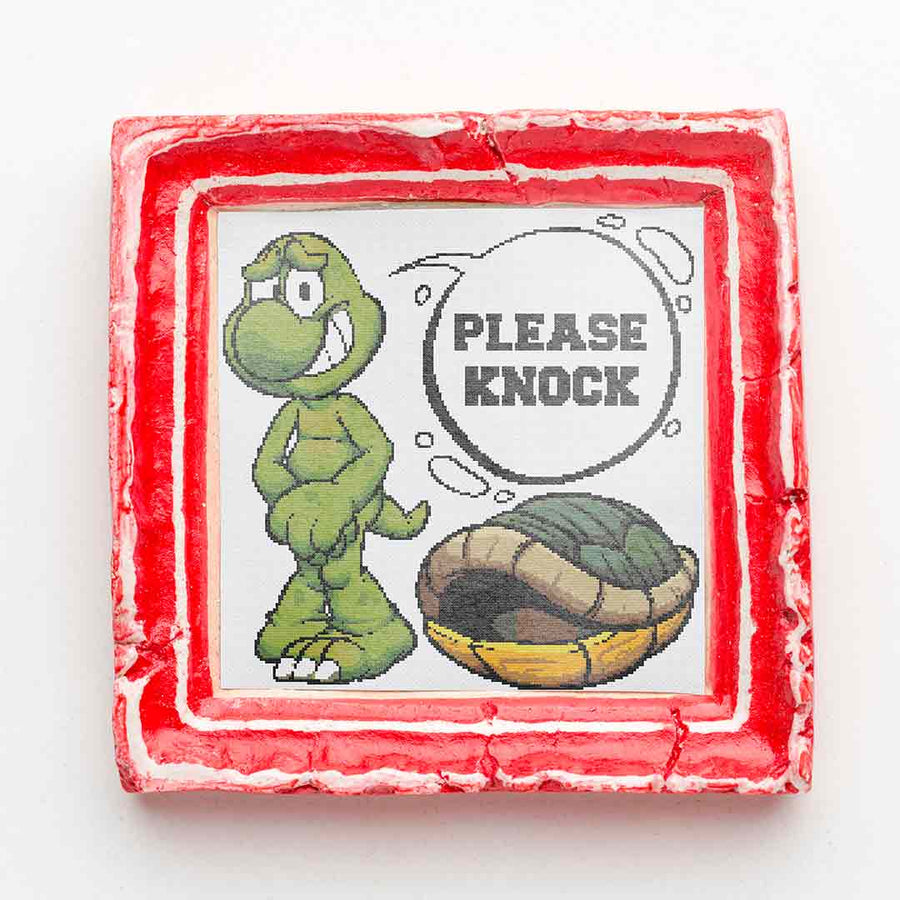 Stitched and framed preview of Please Knock Counted Cross Stitch Pattern and Kit