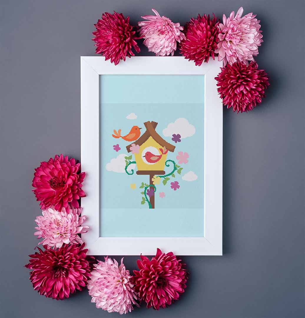 Stitched and framed preview of Spring Is In The Air Counted Cross Stitch Pattern and Kit