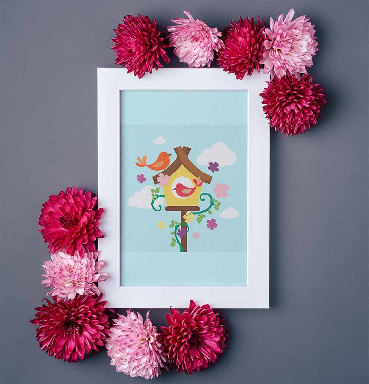 Stitched and framed preview of Spring Is In The Air Counted Cross Stitch Pattern and Kit