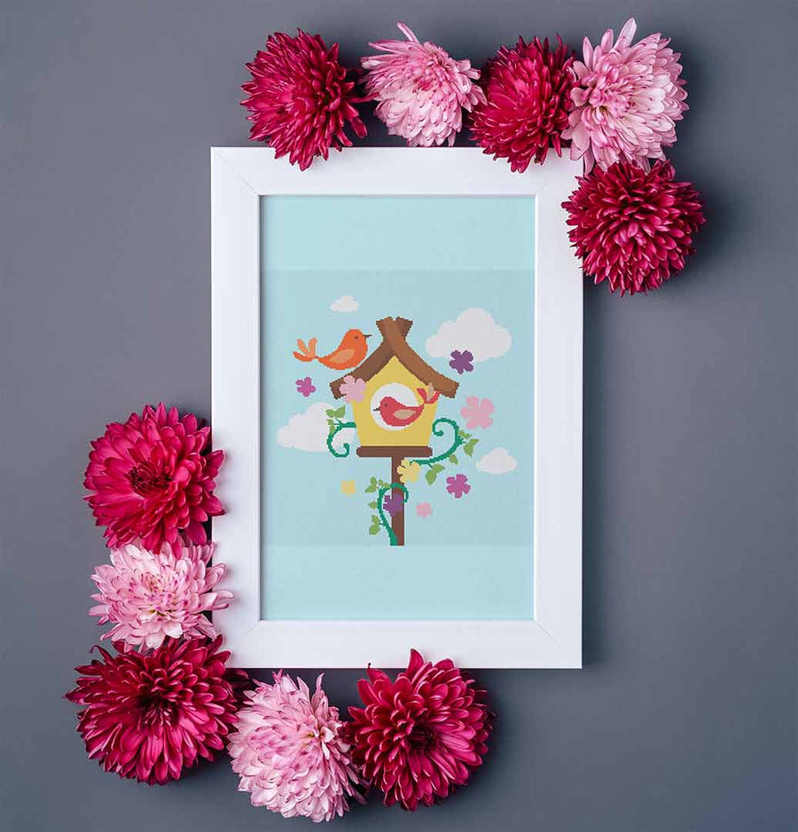 Stitched and framed preview of Spring Is In The Air Counted Cross Stitch Pattern and Kit