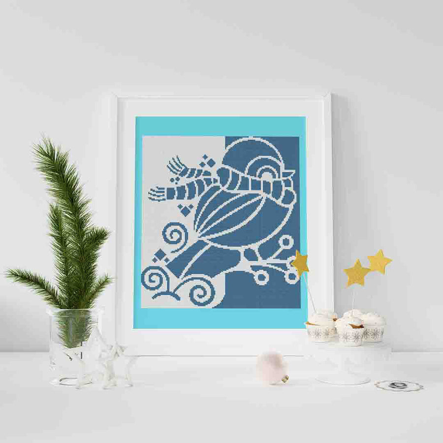 Stitched and framed preview of Winter Bird Counted Cross Stitch Pattern and Kit
