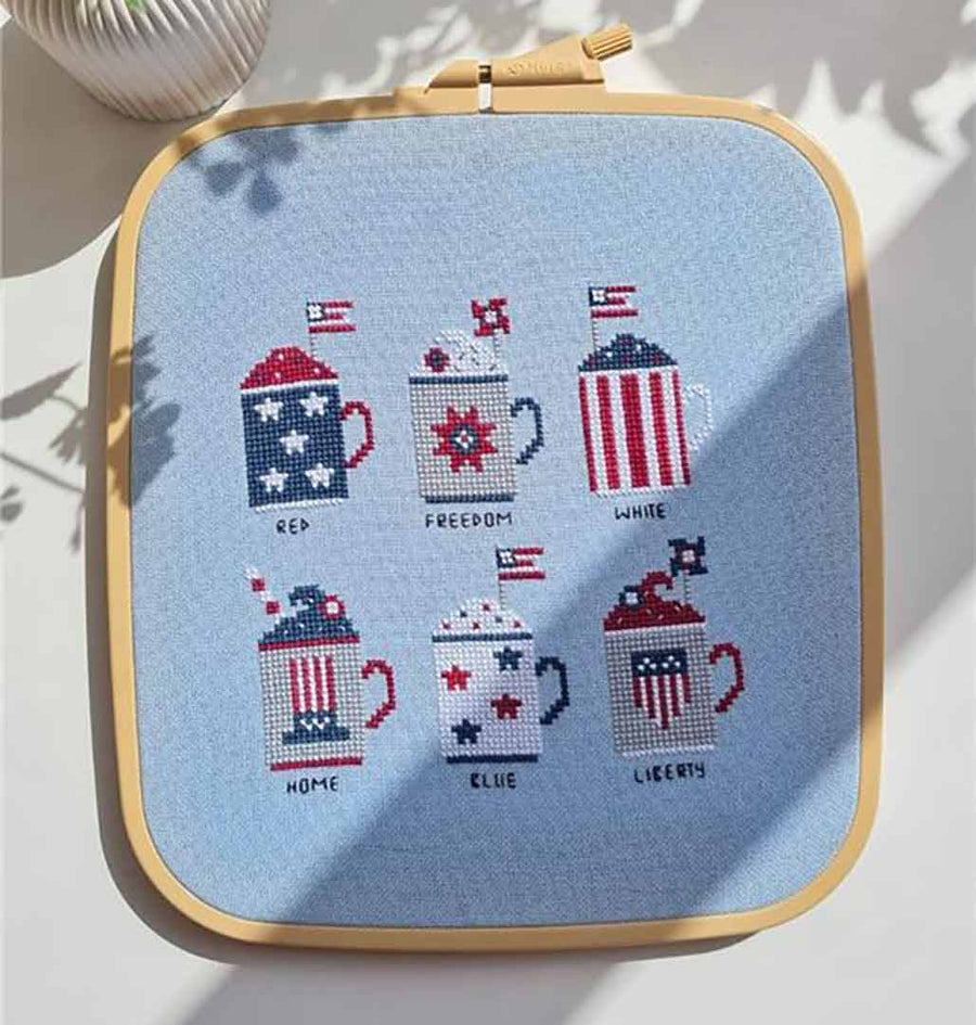 A stitched preview of the counted cross stitch pattern 4th Of July Mugs by Kate Spiridonova