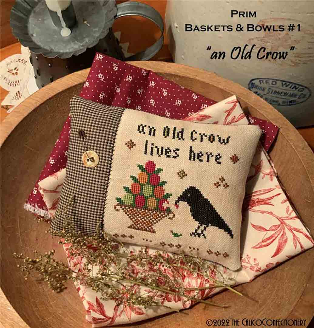 A stitched predivew of the counted cross stitch pattern An Old Crow by The Calico Confectionery