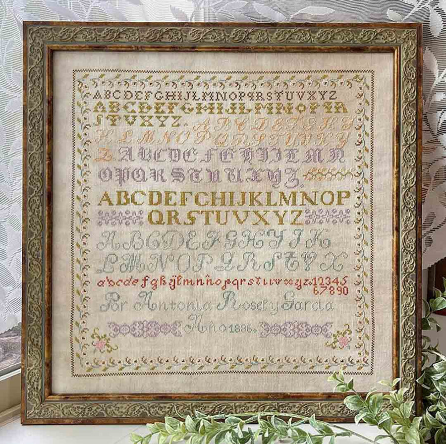 A stitched preview of the counted cross stitch pattern Antonia Rosel y Garcia 1886 by Jan Hicks Creates