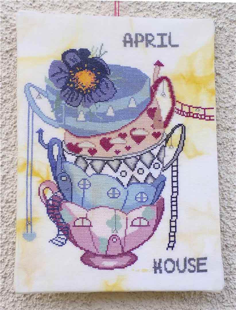 A stitched preview of the counted cross stitch pattern April House by Alessandra Adelaide