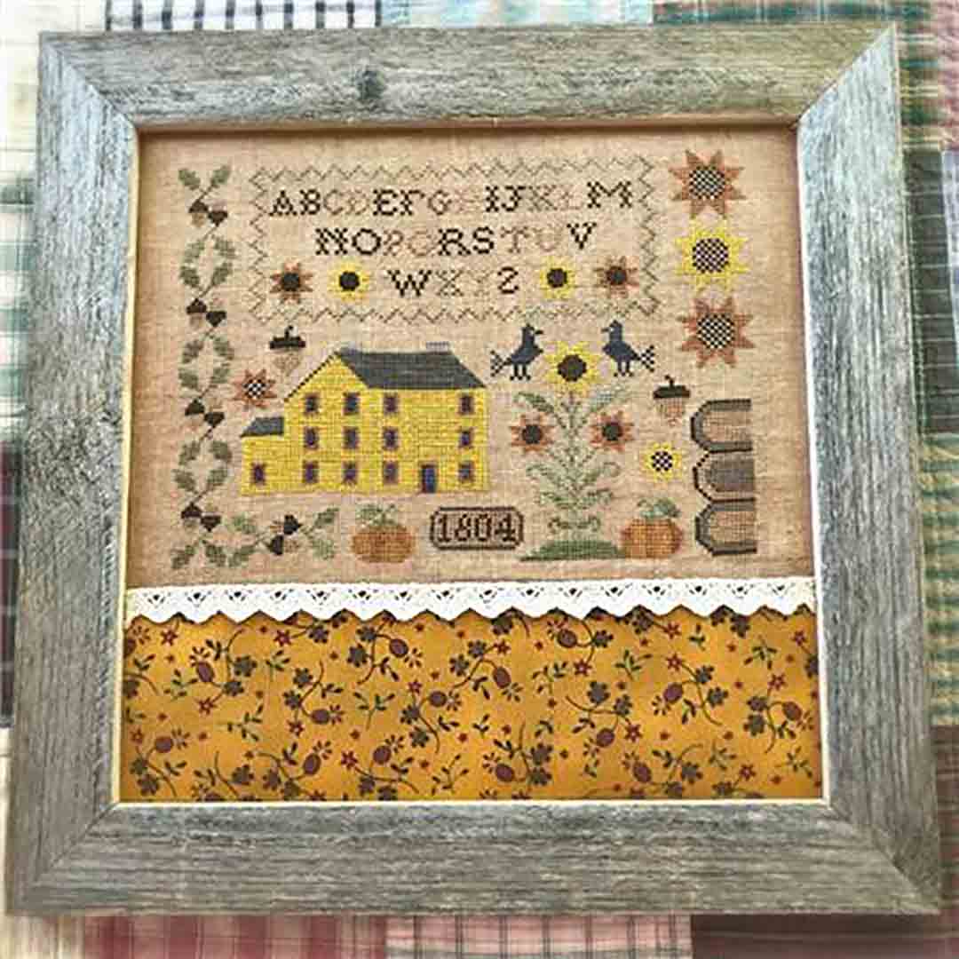 A stitched preview of the counted cross stitch pattern Autumn At Sunflower Ridge by The Woolly Ewe