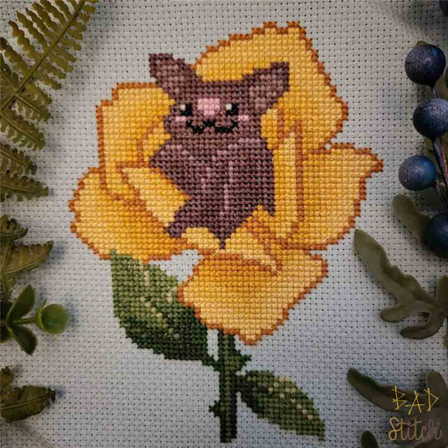 A stitched preview of the counted cross stitch pattern Bat In A Flower by BAD Stitch