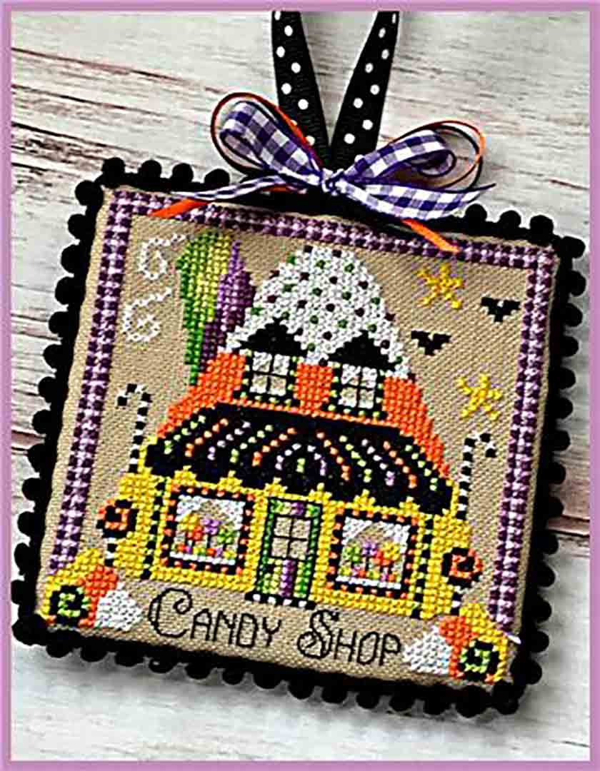 A stitched preview of the counted cross stitch pattern Booville Candy Shop by Sugar Stitches Design