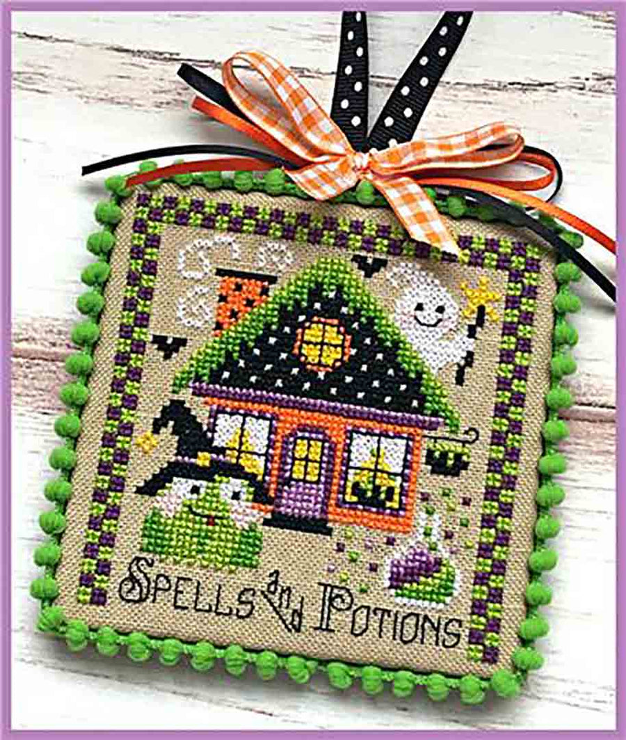 A stitched preview of the counted cross stitch pattern Booville Magic Shop by Sugar Stitches Design
