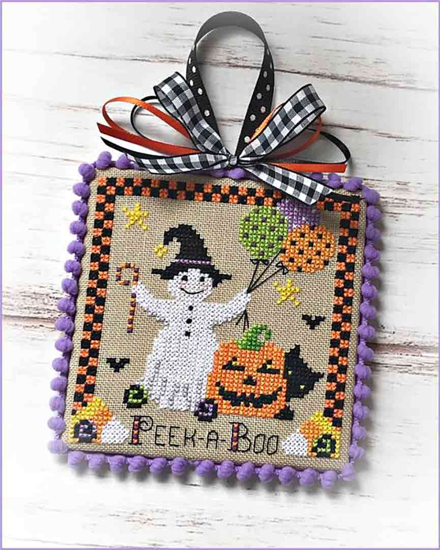 A stitched preview of the counted cross stitch pattern Booville Peek-A-Boo by Sugar Stitches Design