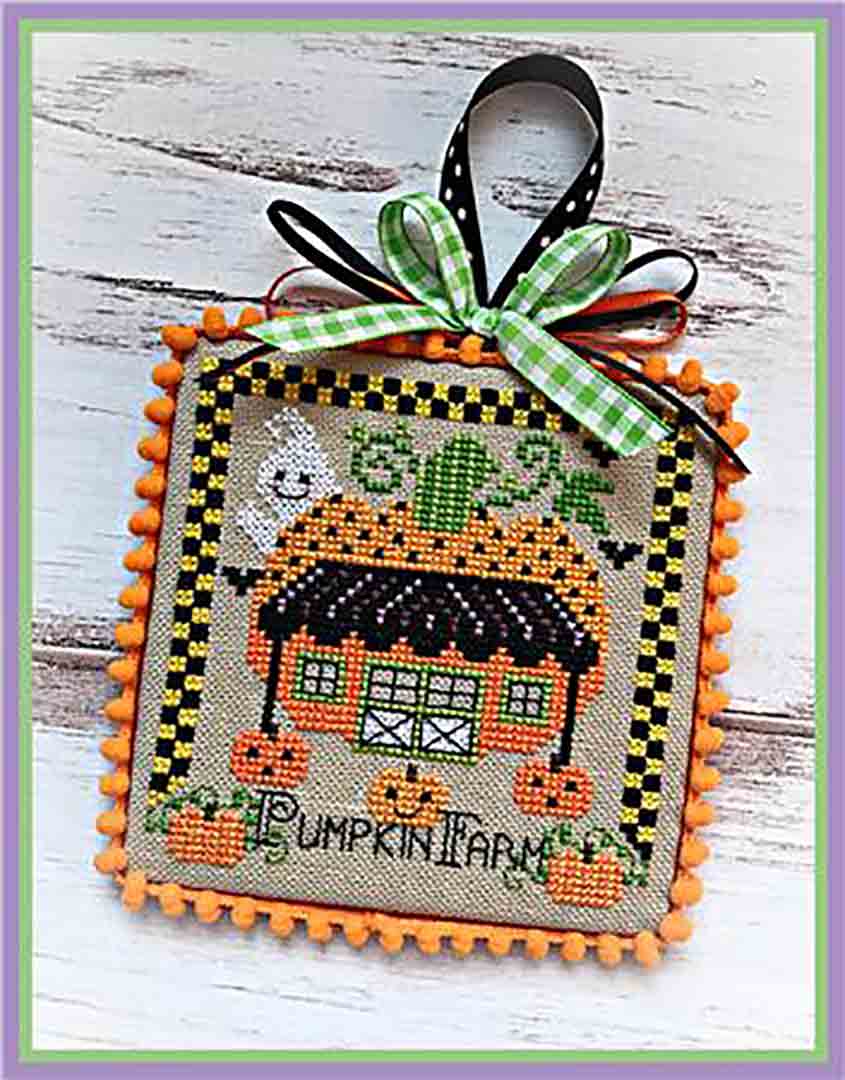 A stitched preview of the counted cross stitch pattern Booville Pumpkin Farm by Sugar Stitches Design