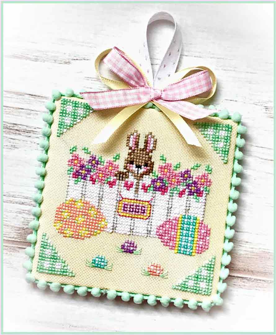 A stitched preview of the counted cross stitch pattern Bunny Trail Eggs by Sugar Stitches Design