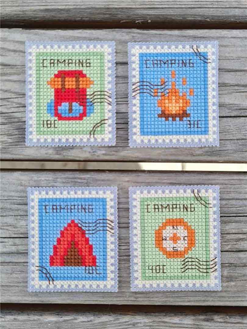 A stitched preview of the counted cross stitch pattern Camping Postage Stamps by Kate Spiridonova