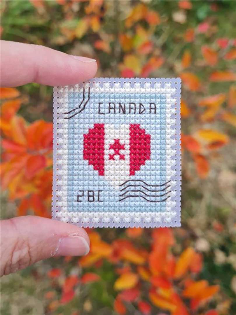 A stitched preview of the counted cross stitch pattern Canada Postage Stamp by Kate Spiridonova