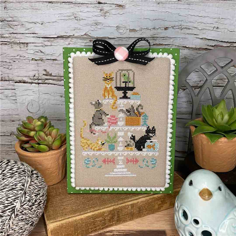 A stitched preview of the counted cross stitch pattern Cat Tier by Erin Elizabeth Designs