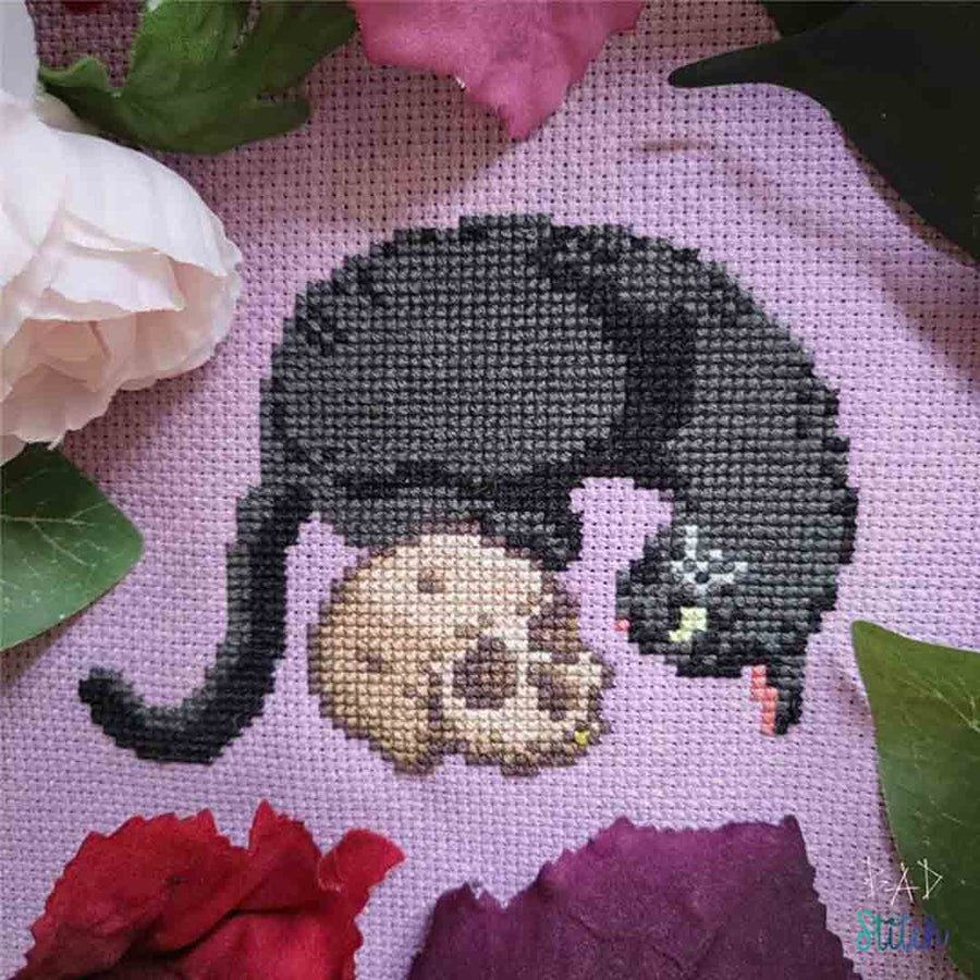 A stitched preview of the counted cross stitch pattern Cat and Skull by BAD Stitch