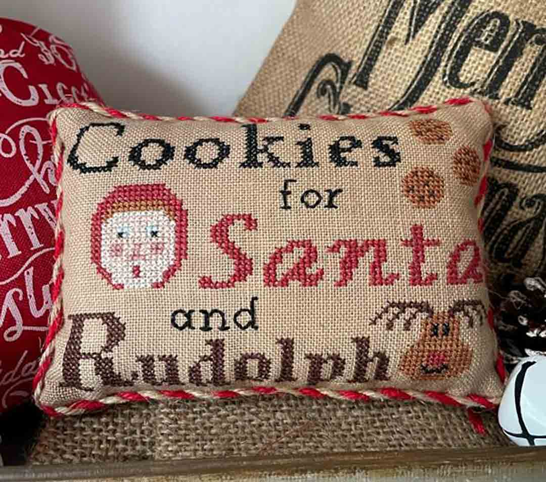 A stitched preview of the counted cross stitch pattern Christmas Cookies by Mani di Donna Design