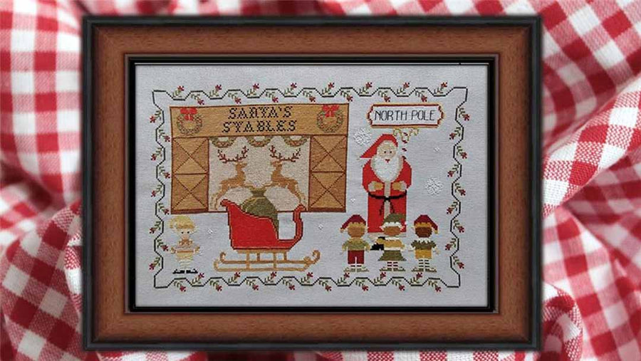 a stitched preview of the counted cross stitch pattern Christmas Eve At Santa's Stables by Twin Peak Primitives