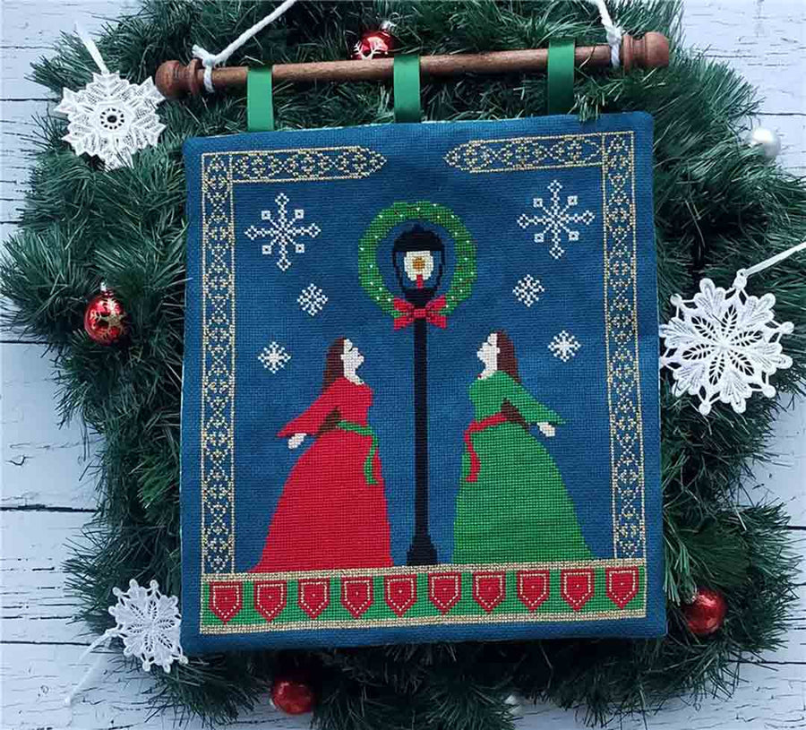 A stitched preview of the counted cross stitch pattern Christmas Maidens by KEB Studio Creations