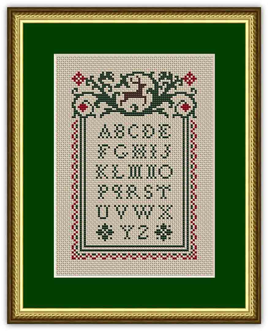 A stitched preview of the counted cross stitch pattern Christmas Reindeer Alphabet Sampler by Happiness Is Heartmade