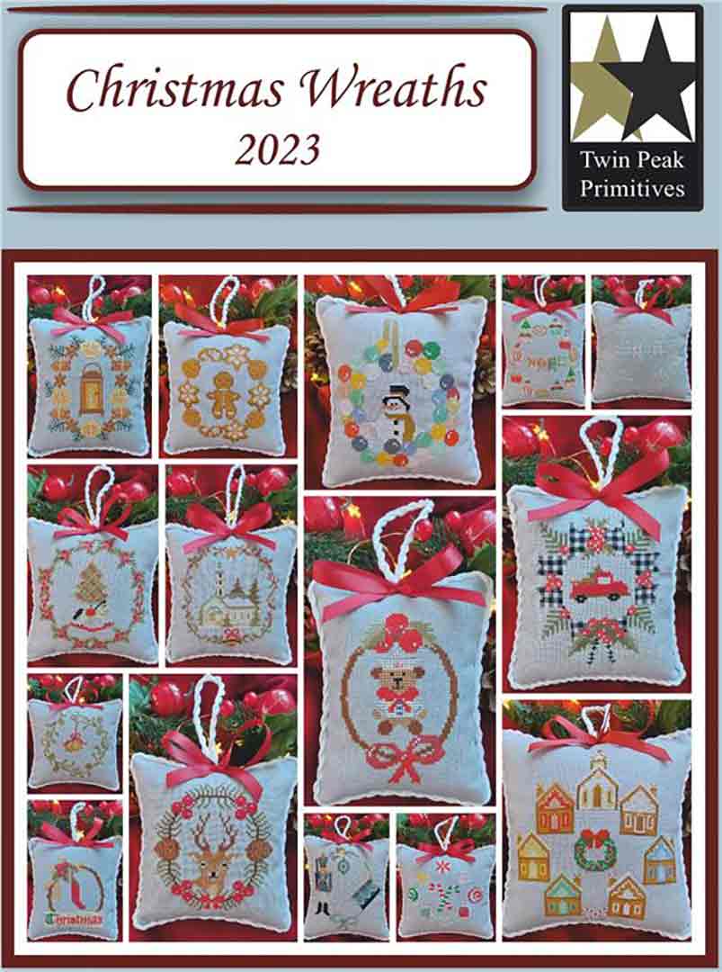 An image of the cover of the counted cross stitch pattern Christmas Wreaths 2023 by Twin Peak Primitives