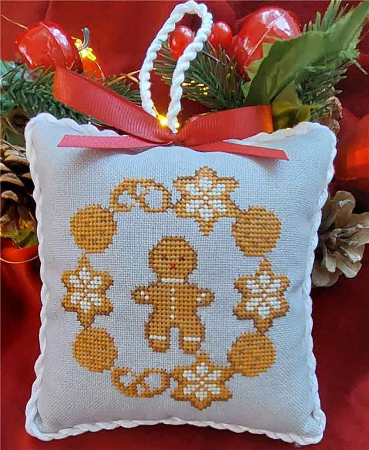 A stitched preview of the counted cross stitch pattern Christmas Wreaths 2023 by Twin Peak Primitives