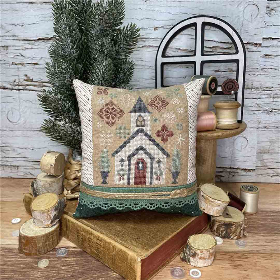 A stitched preview of the counted cross stitch pattern Church On Holly Hill by Erin Elizabeth Designs