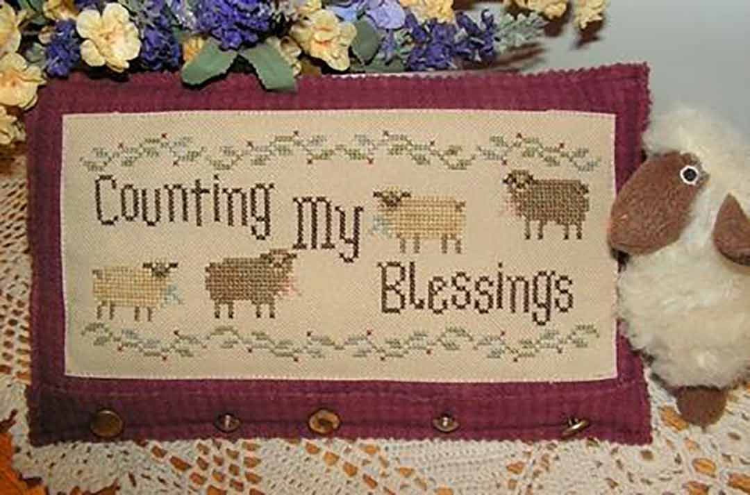 A stitched preview of the counted cross stitch pattern Counting My Blessings by Janis Lockhart
