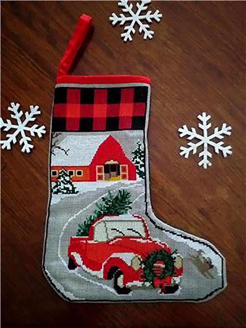A stitched preview of the counted cross stitch pattern Country Christmas Stockings by Twin Peak Primitives