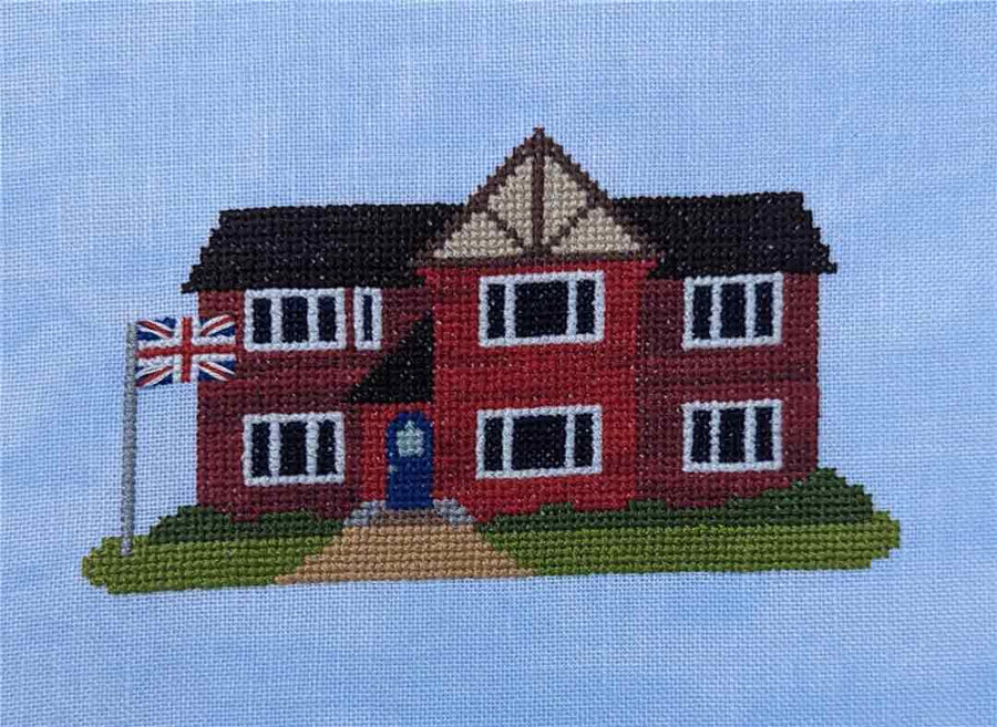 A stitched preview of the counted cross stitch pattern England House by KEB Studio Creations