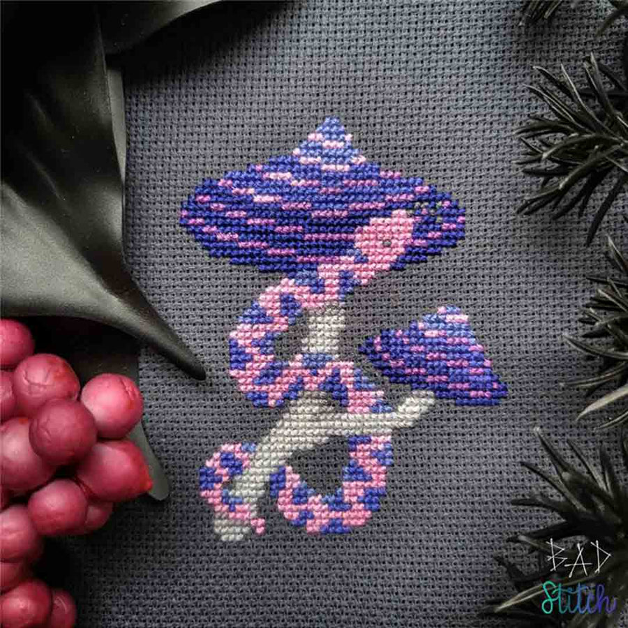 A stitched preview of the counted cross stitch pattern Entangled Snake by BAD Stitch