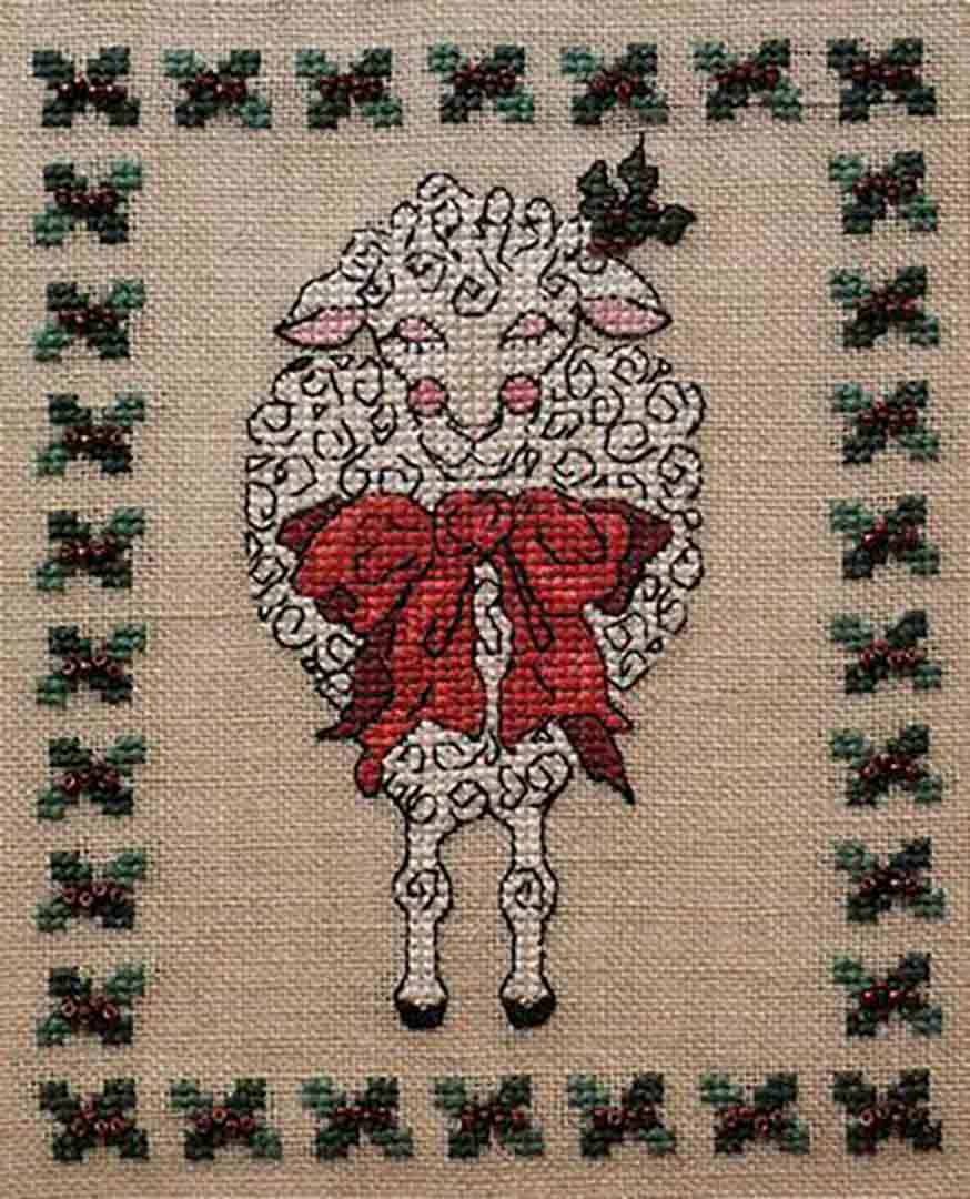 A stitched preview of the counted cross stitch pattern F'leece Navidad by Janis Lockhart