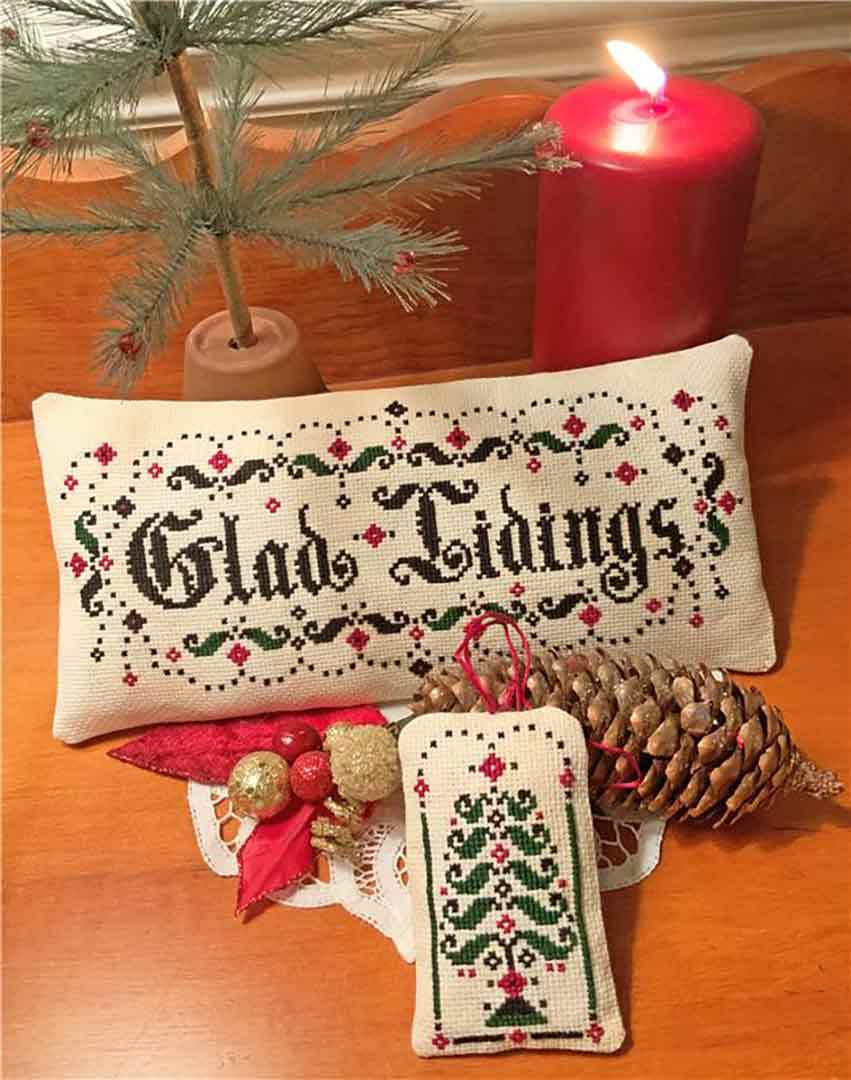 A stitched preview of the counted cross stitch pattern Glad Tidings by The Calico Confectionery
