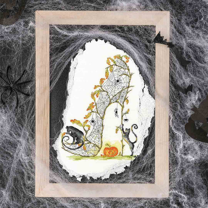 Stitched and framed preview of Gossamer Slipper Counted Cross Stitch Kit