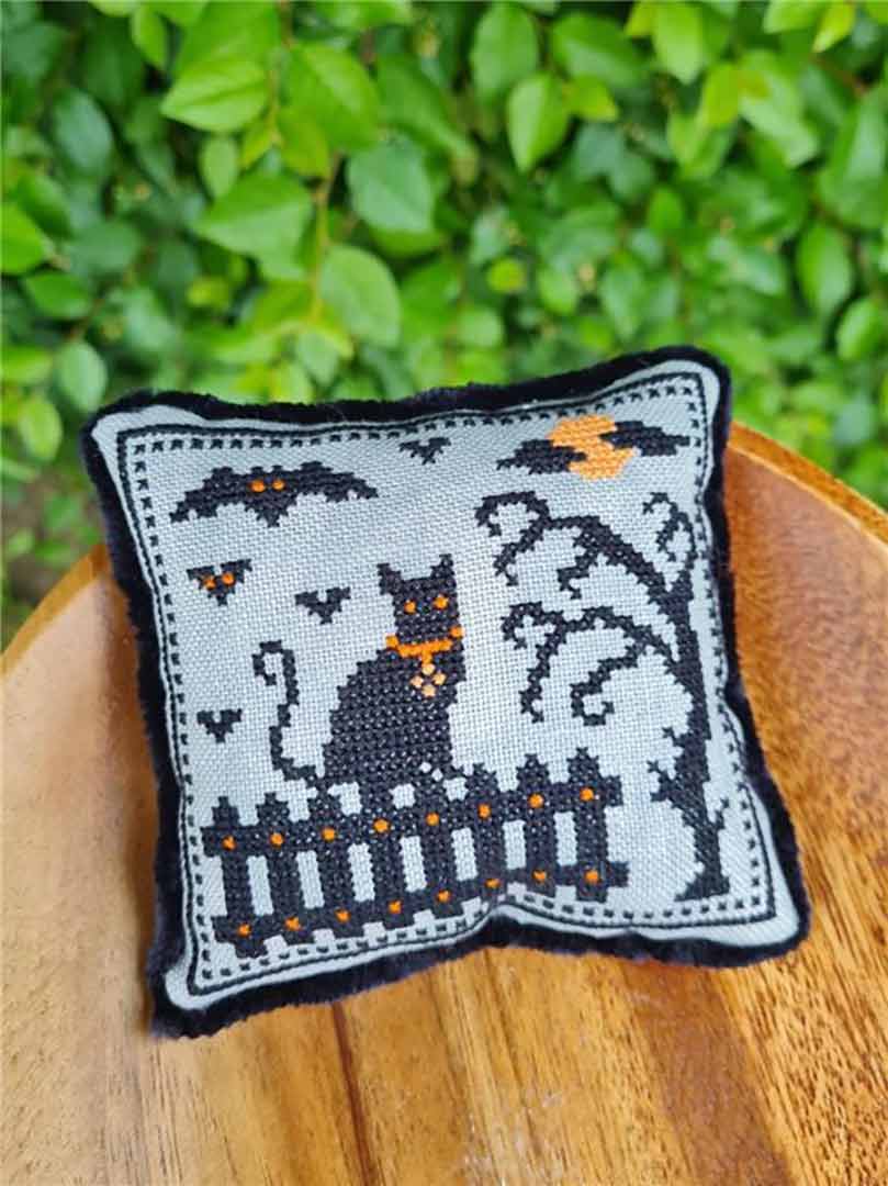 A stitched preview of the counted cross stitch pattern Halloween Cat by Kate Spiridonova