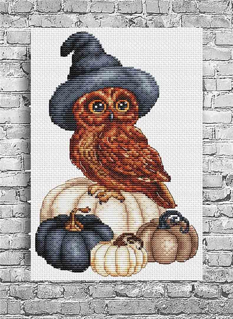 A stitched preview of the counted cross stitch pattern Halloween Owl Pumpkin by Les Petites Croix De Lucie